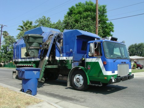 Low-emission van loading garden clearance materials for local transfer station