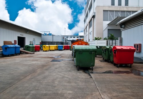 Professionals conducting garage clearance in a Greenwich home